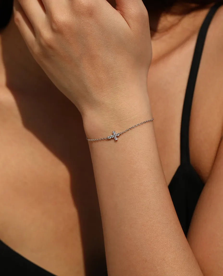 Moissanite cross charm bracelet in 925 sterling silver