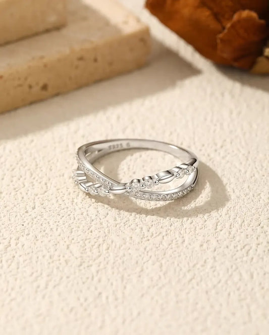 Moissanite crossover twist ring in 925 sterling silver