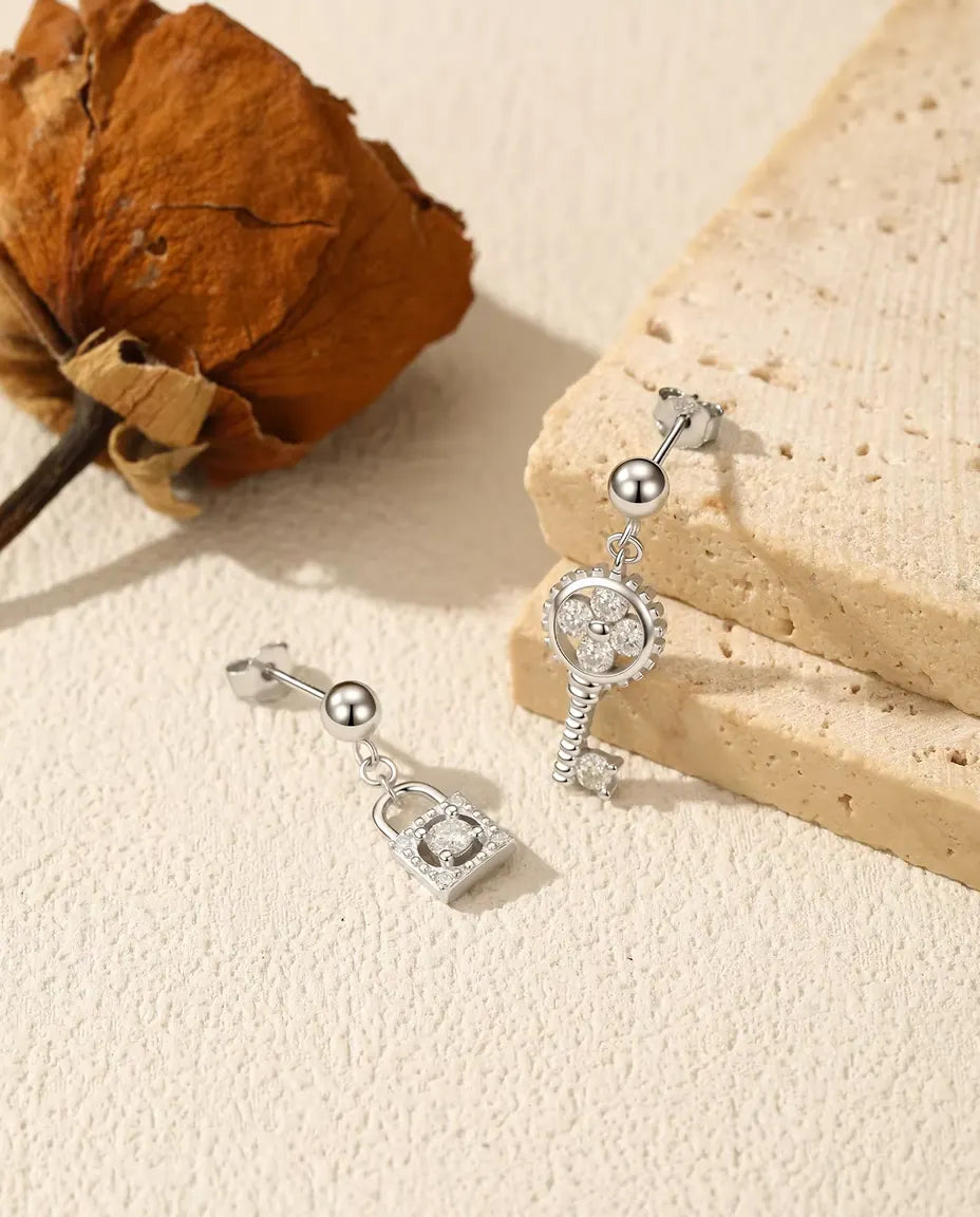 Moissanite key and lock mismatched drop earrings in 925 sterling silver