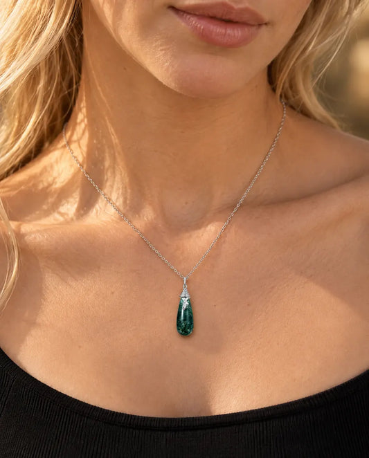 Moss Agate Teardrop Necklace in 925 Sterling Silver - worn on a model, close-up at the collarbone