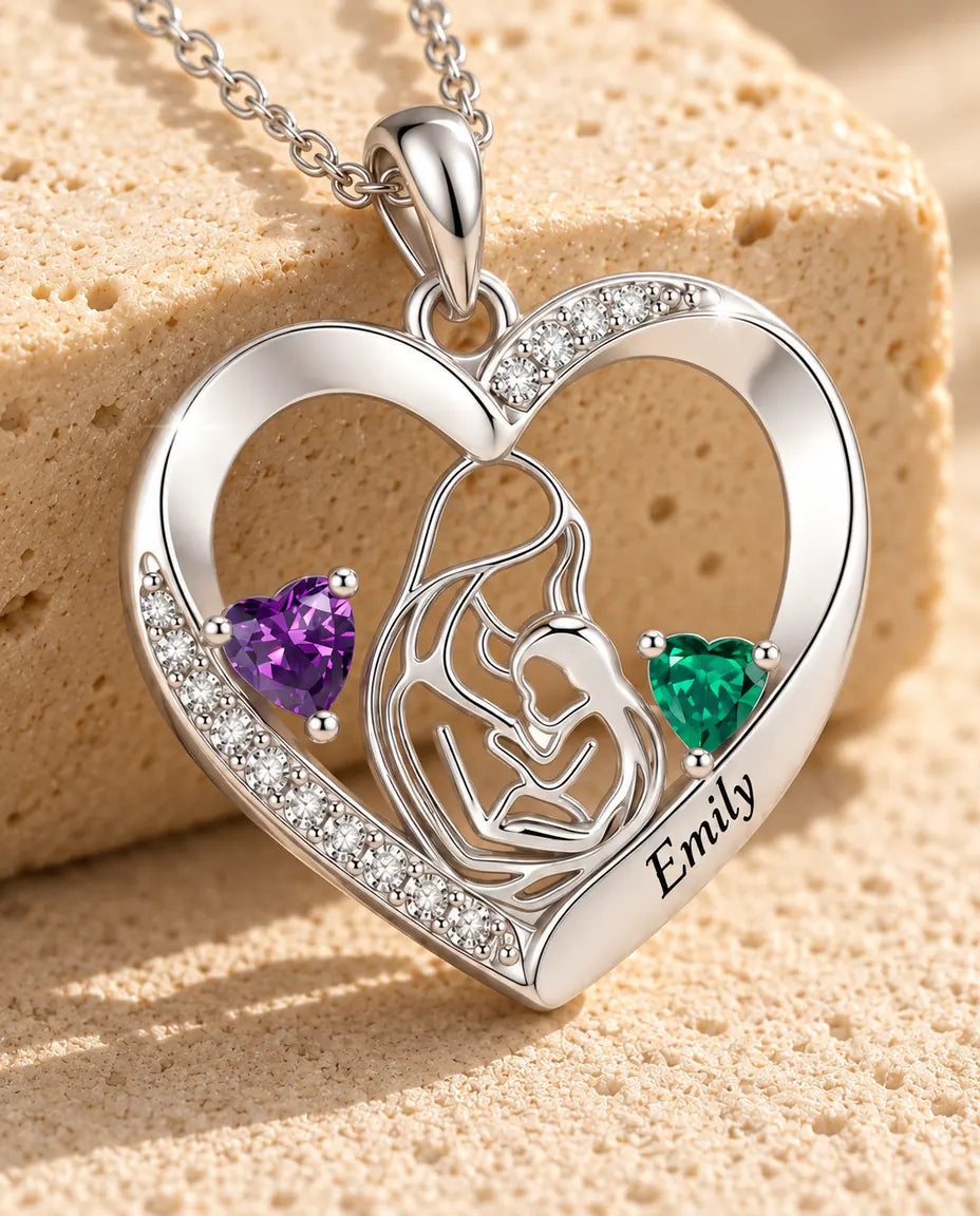 Close-up of the mother and child heart pendant with two heart-cut birthstones