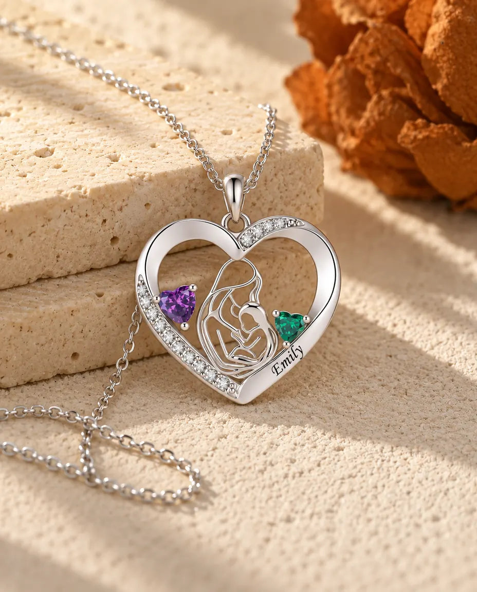 Mother and child heart necklace photographed from a low angle