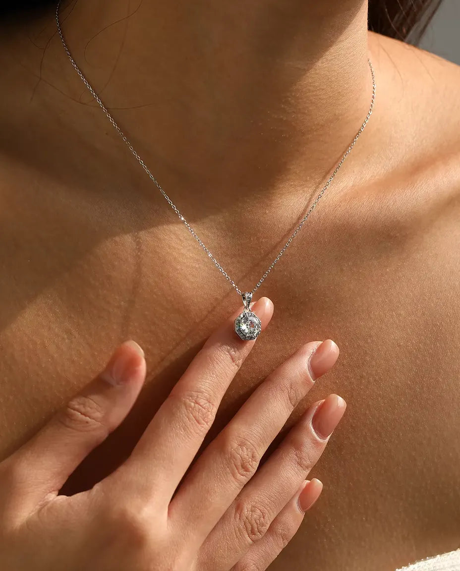Octagon halo pendant necklace in 925 sterling silver with a step cut clear stone