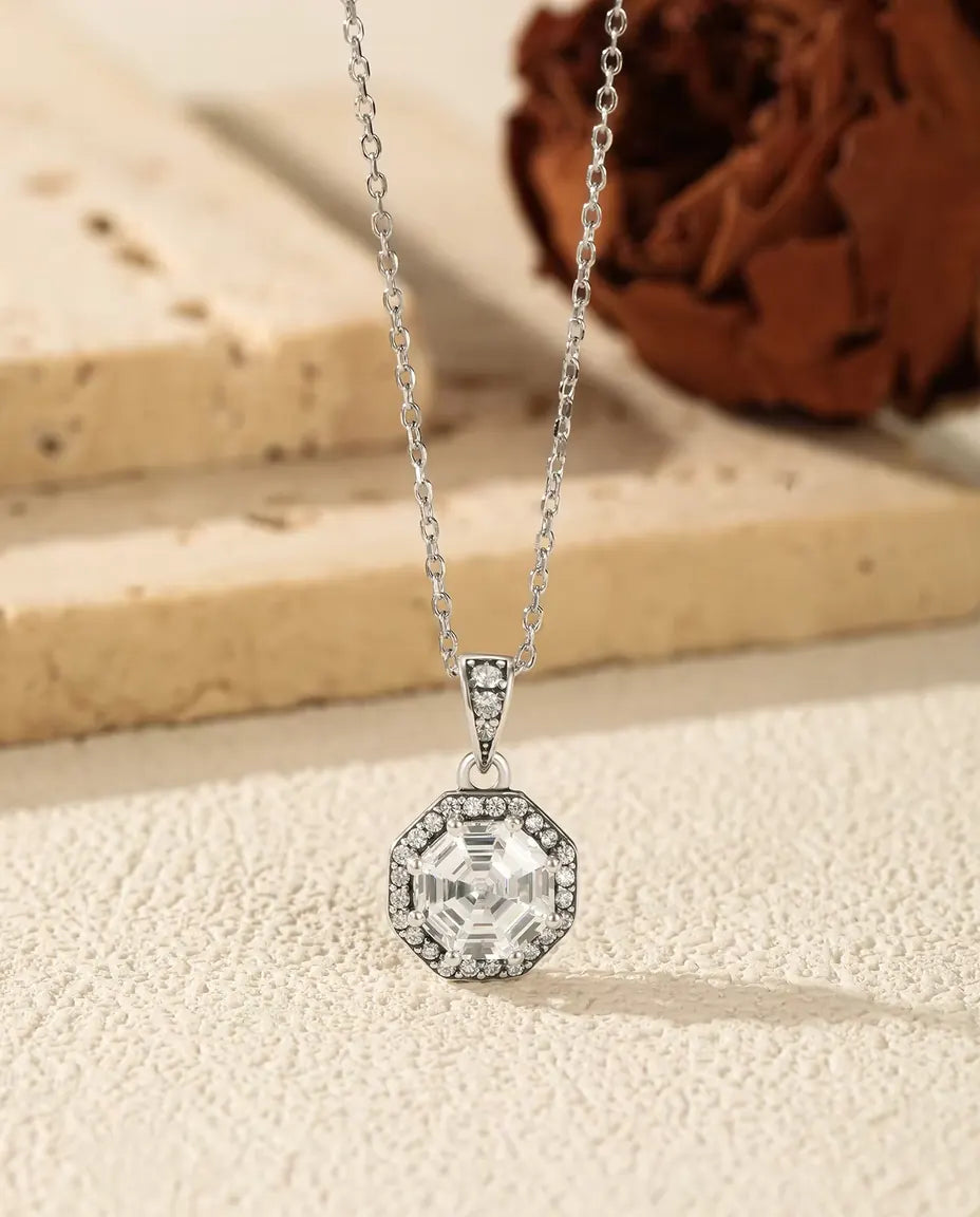 Octagon halo pendant necklace in 925 sterling silver with a step cut clear stone