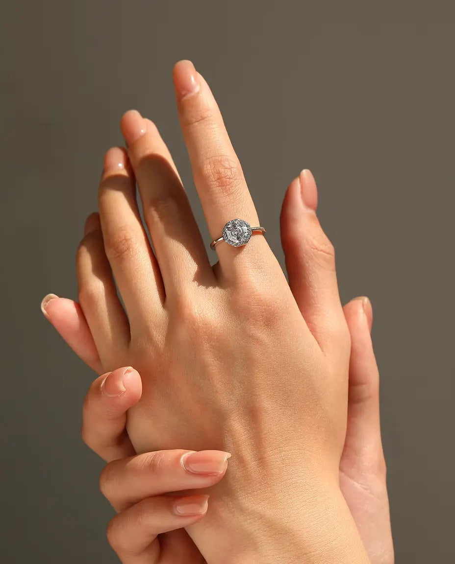 Octagon halo step cut zirconia solitaire ring in 925 sterling silver