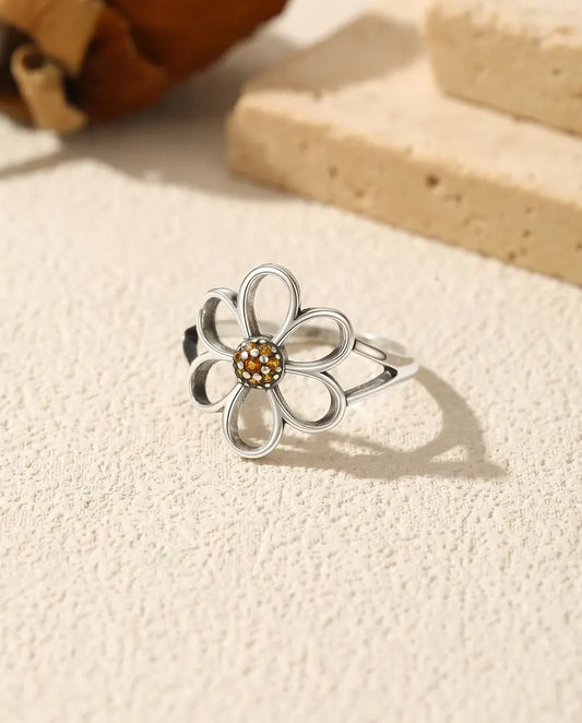 Open flower ring with orange zirconia center in 925 silver