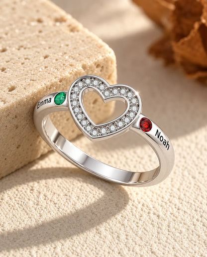 personalized open heart birthstone ring with 2 names and 2 bezel set birthstones on a single band, rhodium plated