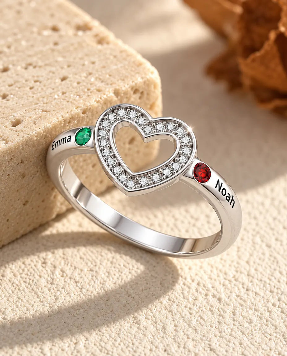 personalized open heart birthstone ring with 2 names and 2 bezel set birthstones on a single band, rhodium plated