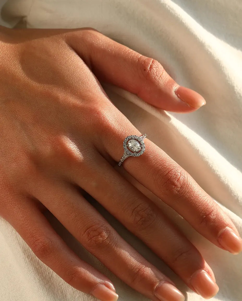 Oval halo moissanite engagement ring in 925 sterling silver