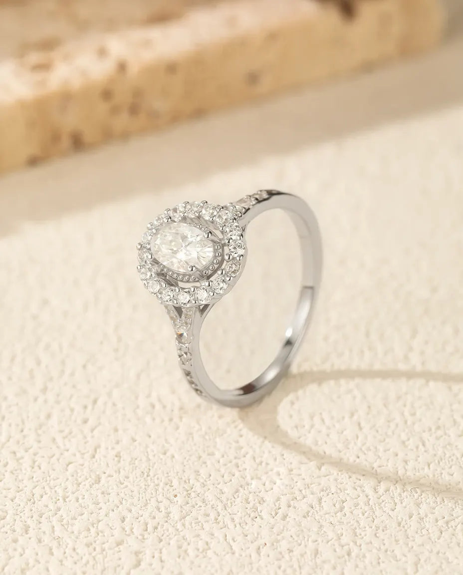 Oval halo moissanite engagement ring in 925 sterling silver