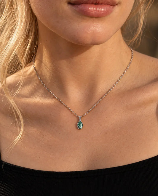 Oval Moss Agate Necklace in 925 Sterling Silver - worn on a model, close-up at the collarbone