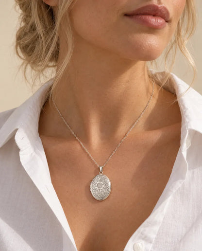 Personalized Oval Photo Locket Necklace That Holds 2 Pictures worn on a model