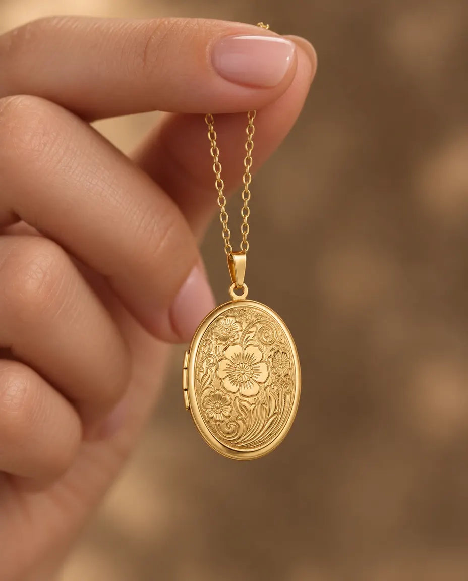 Personalized Oval Photo Locket Necklace That Holds 2 Pictures held in hand