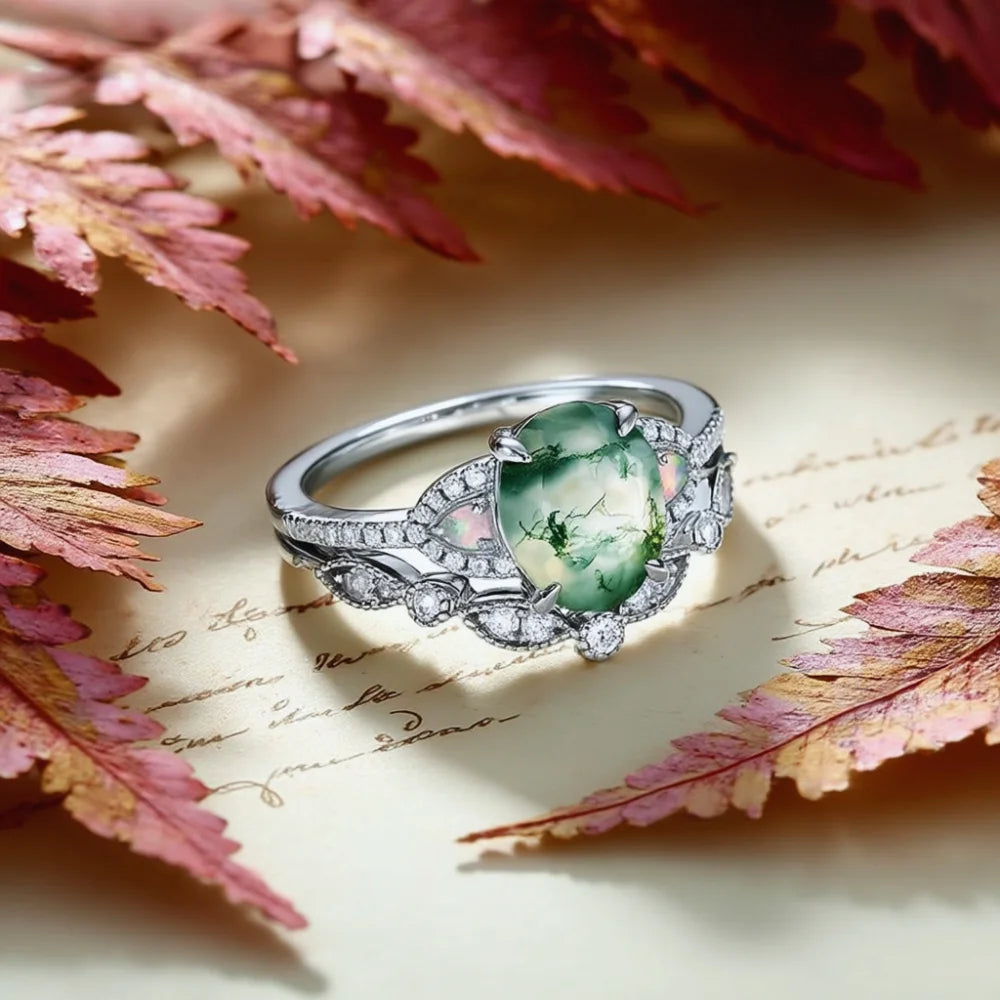 Oval Shaped Moss Agate Ring Set with Opals