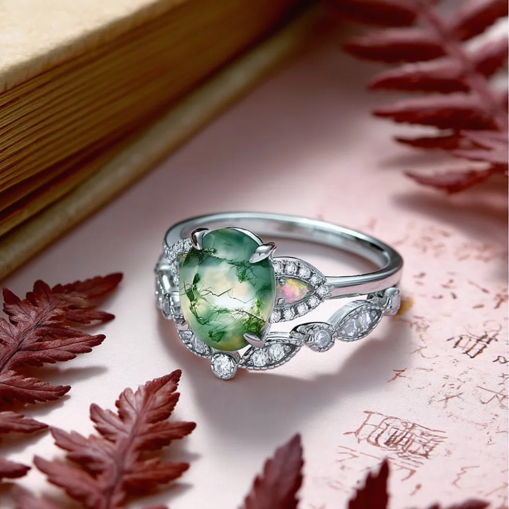 Oval Shaped Moss Agate Ring Set with Opals