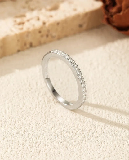 Pavé moissanite wedding band in 925 sterling silver with round D color stones