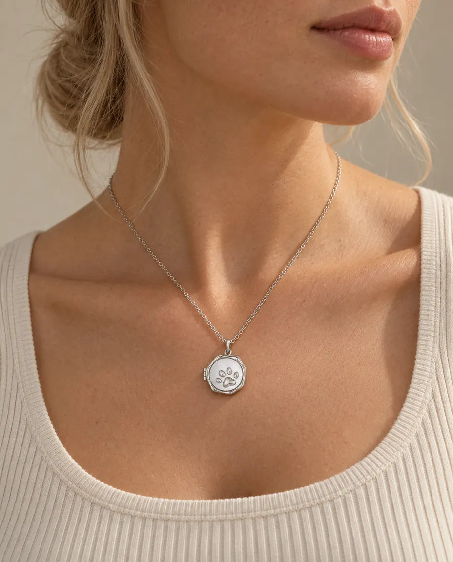 Personalized Paw Print Photo Locket Necklace That Holds 2 Pictures worn on a model