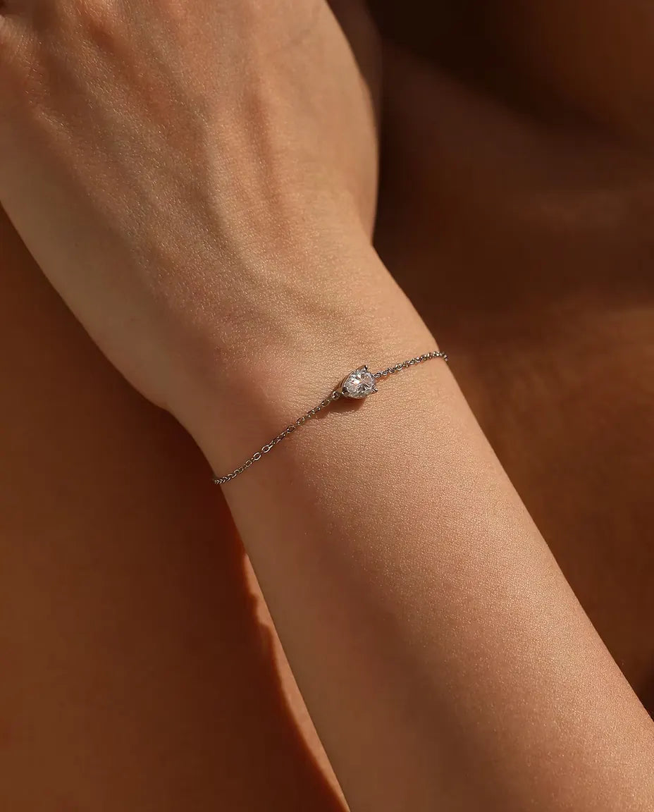 Pear cut moissanite bracelet in 925 sterling silver on a dainty chain