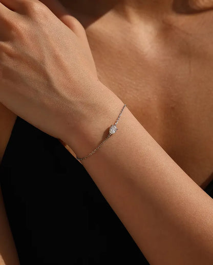 Pear cut moissanite bracelet in 925 sterling silver on a dainty chain