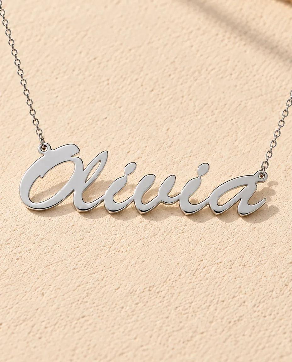 Personalized Brush Script Name Necklace in 925 Sterling Silver - Custom Nameplate - close-up of the cut-out name