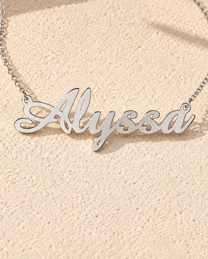 Personalized Script Name Necklace in 925 Sterling Silver - Custom Calligraphy Nameplate - close-up of the cut-out name