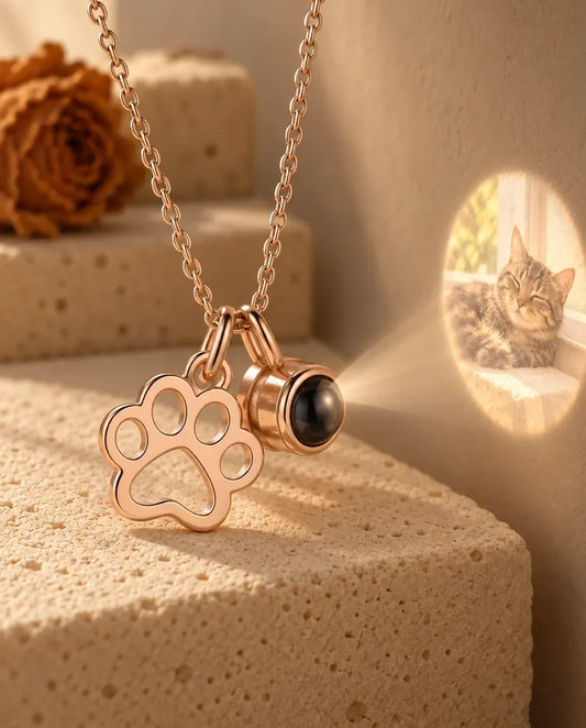 Personalized Paw Print Photo Projection Necklace - projecting the hidden photo onto a wall