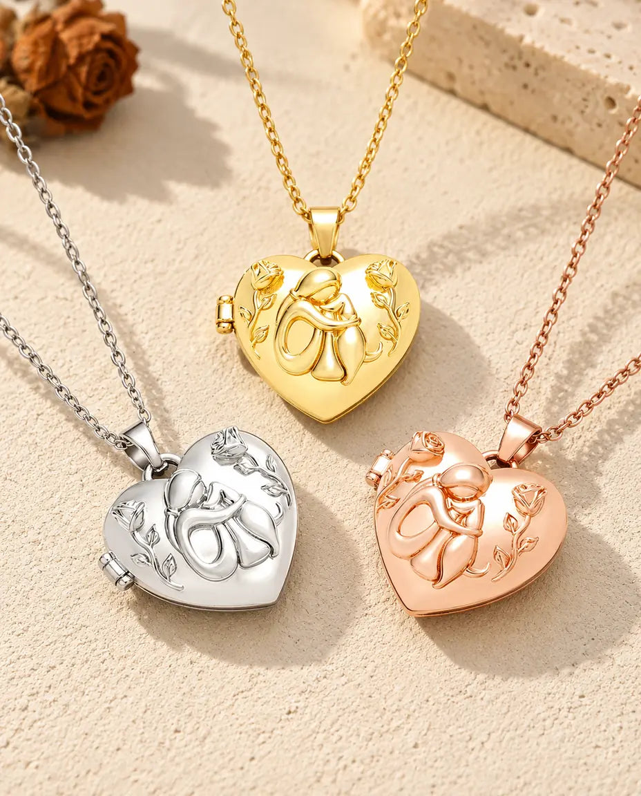 Three colors of the dog lover heart photo locket necklace arranged on plaster
