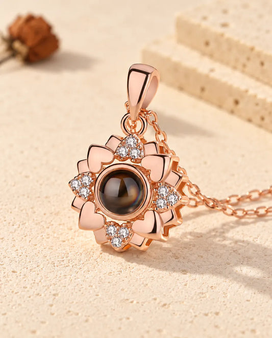 Personalized rose gold tone heart flower photo projection necklace with cubic zirconia on cream plaster