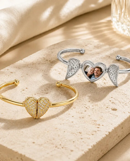 Heart photo bangles with angel wings in silver and gold, opened and closed