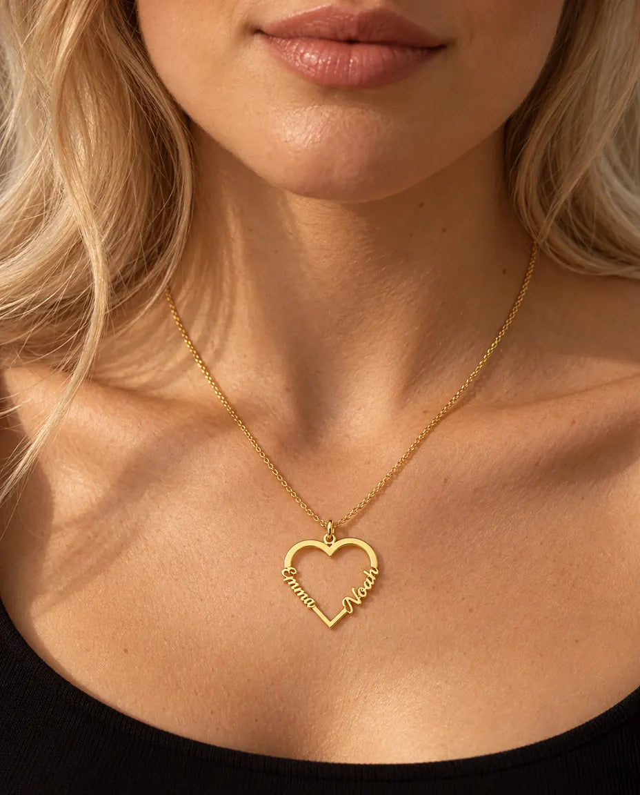 Personalized Heart Name Necklace in 925 Sterling Silver - Open Heart with Two Script Names - worn on a model in gold