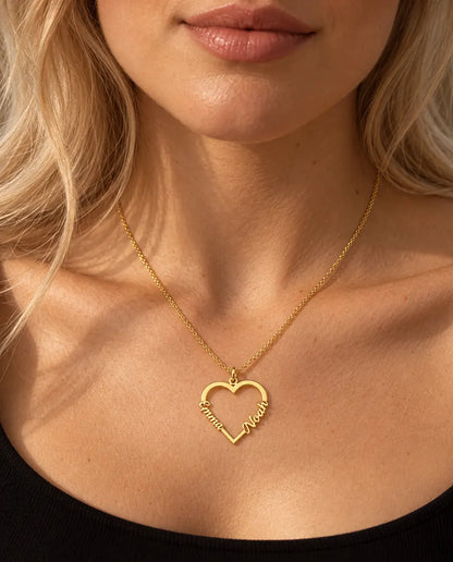 Personalized Heart Name Necklace in 925 Sterling Silver - Open Heart with Two Script Names - worn on a model in gold