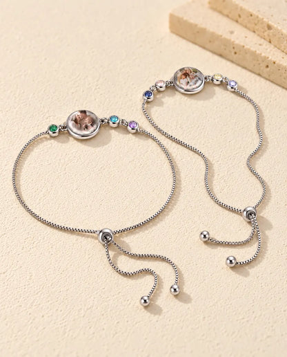 Personalized Photo Bracelet with 1-6 Birthstones - several versions side by side on a ceramic stand