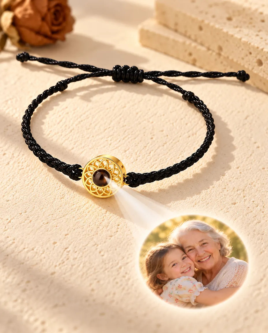 Light through the brown stone of the gold tone round charm projects a round photo onto the plaster