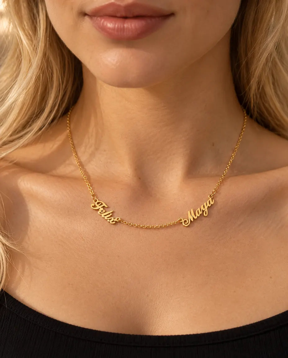 Personalized Two Name Necklace in 925 Sterling Silver - Two Script Nameplates Joined by Chain - worn on a model in gold