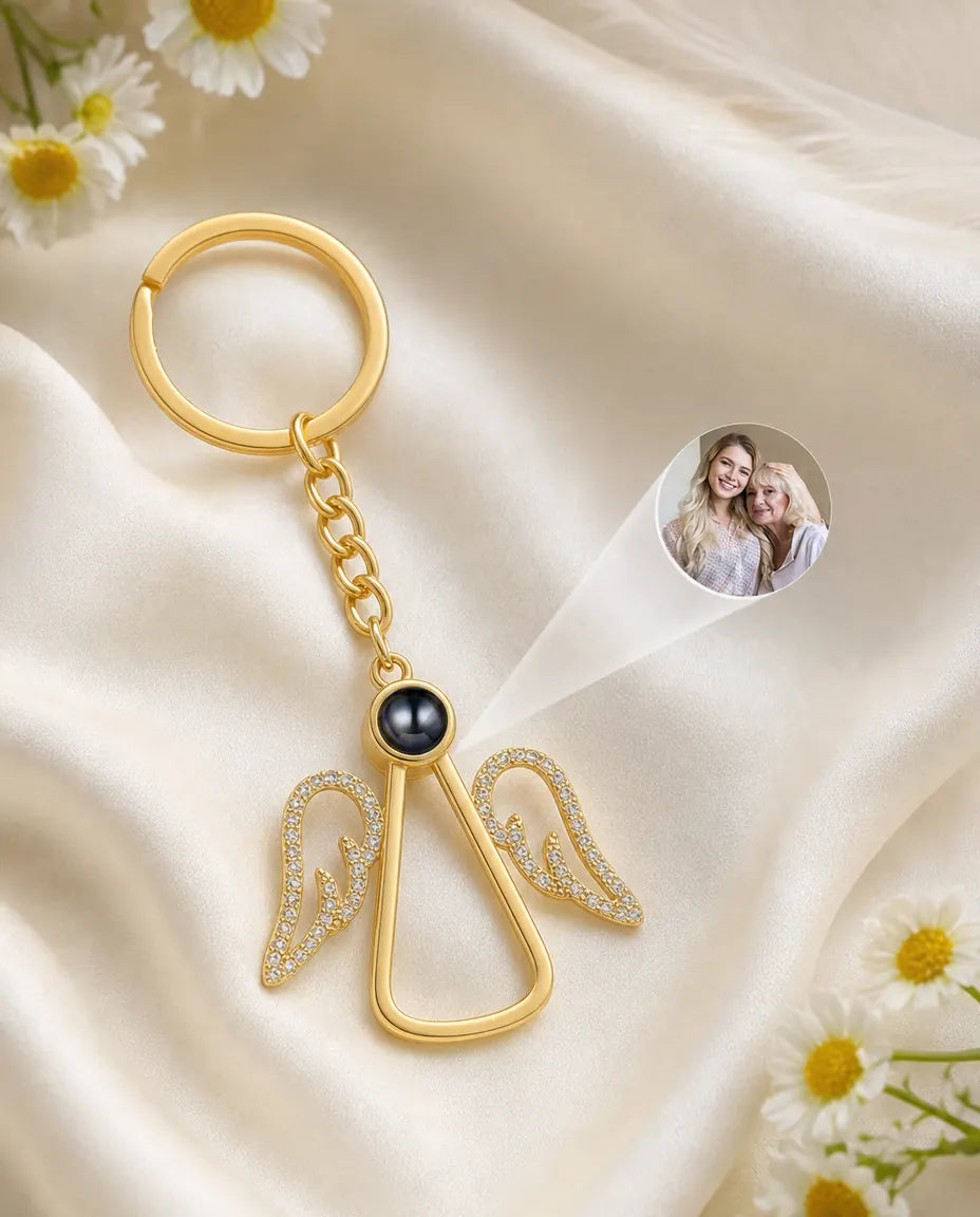 Angel photo projection keychain casting a personalized picture of a mother and daughter