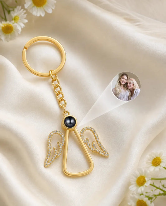 Angel photo projection keychain casting a personalized picture of a mother and daughter