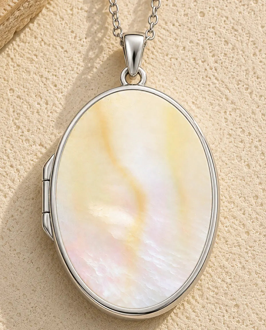 Mother of pearl back panel of the oval photo locket necklace