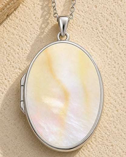 Mother of pearl back panel of the oval photo locket necklace