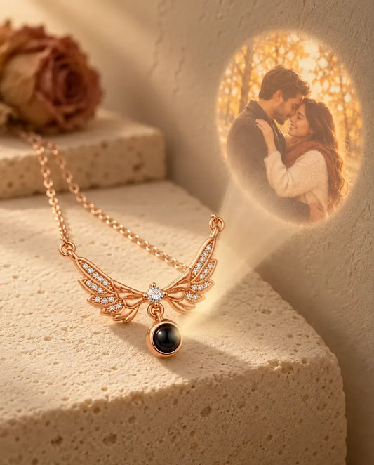 Personalized Angel Wing Photo Projection Necklace in Rose Gold - projecting the hidden photo onto a wall