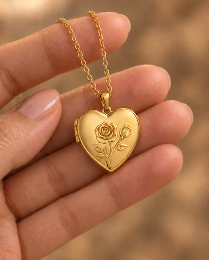 Personalized Photo Locket Necklace That Holds 2 Pictures - Rose Relief Heart Locket With Mother of Pearl Back held in hand