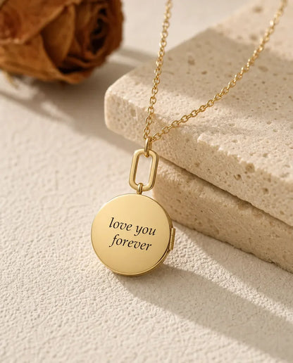 Back of the gold round locket engraved with love you forever