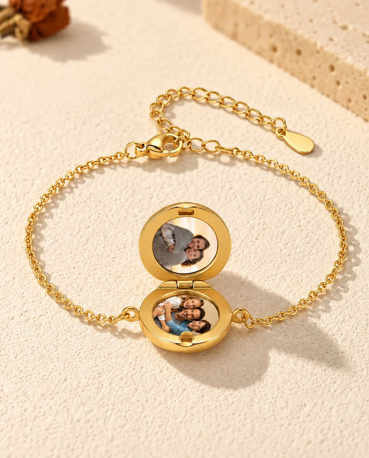 Round locket bracelet open, with two photos inside