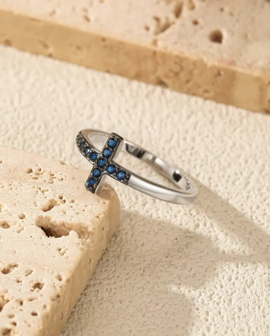 Sideways cross ring with blue zirconia pave in 925 sterling silver