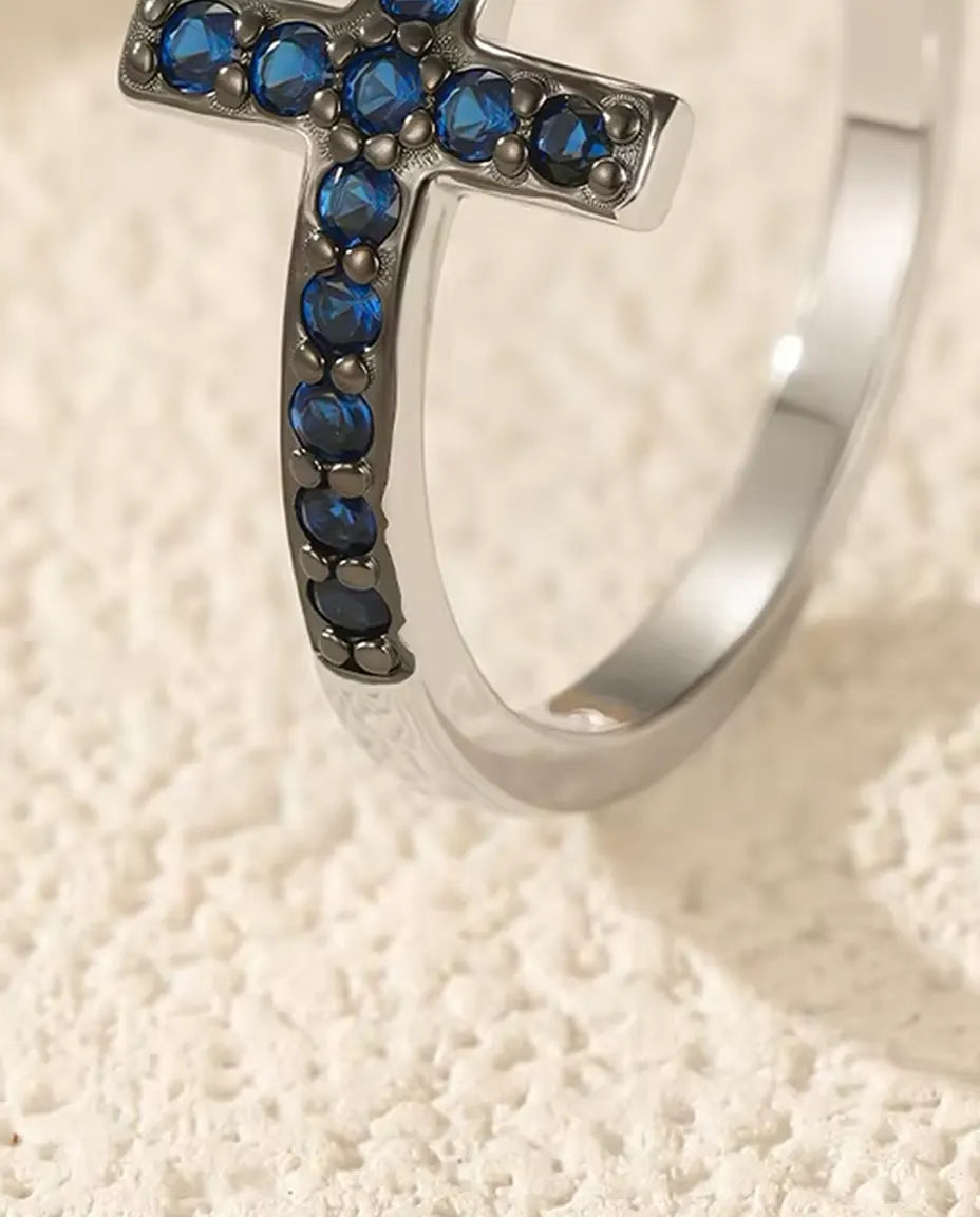 Sideways cross ring with blue zirconia pave in 925 sterling silver