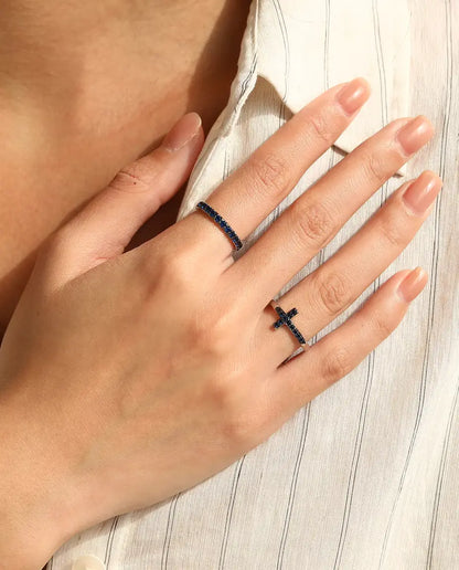 Sideways cross ring with blue zirconia pave in 925 sterling silver