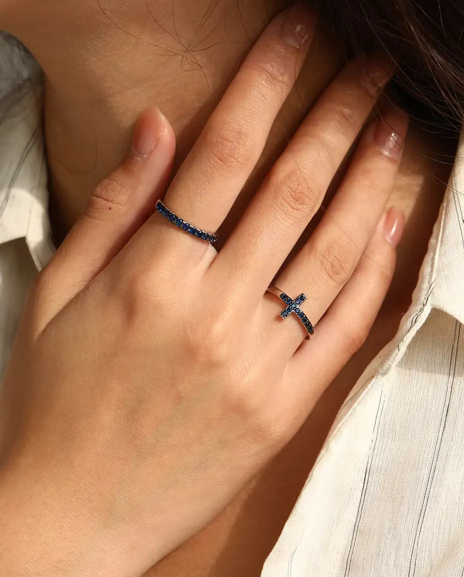 Sideways cross ring with blue zirconia pave in 925 sterling silver