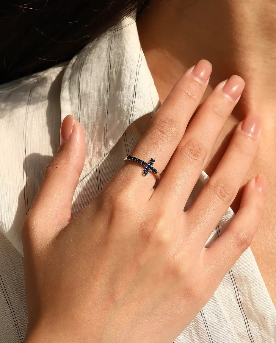 Sideways cross ring with blue zirconia pave in 925 sterling silver