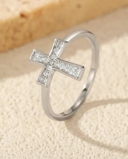 Sideways cross moissanite ring in 925 sterling silver with pave stones