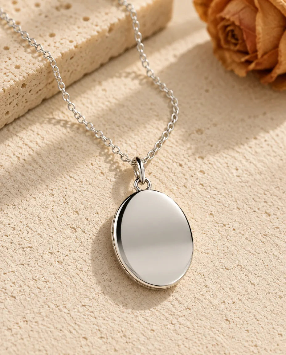 Oval Photo Locket Necklace with Picture Inside - front view in silver