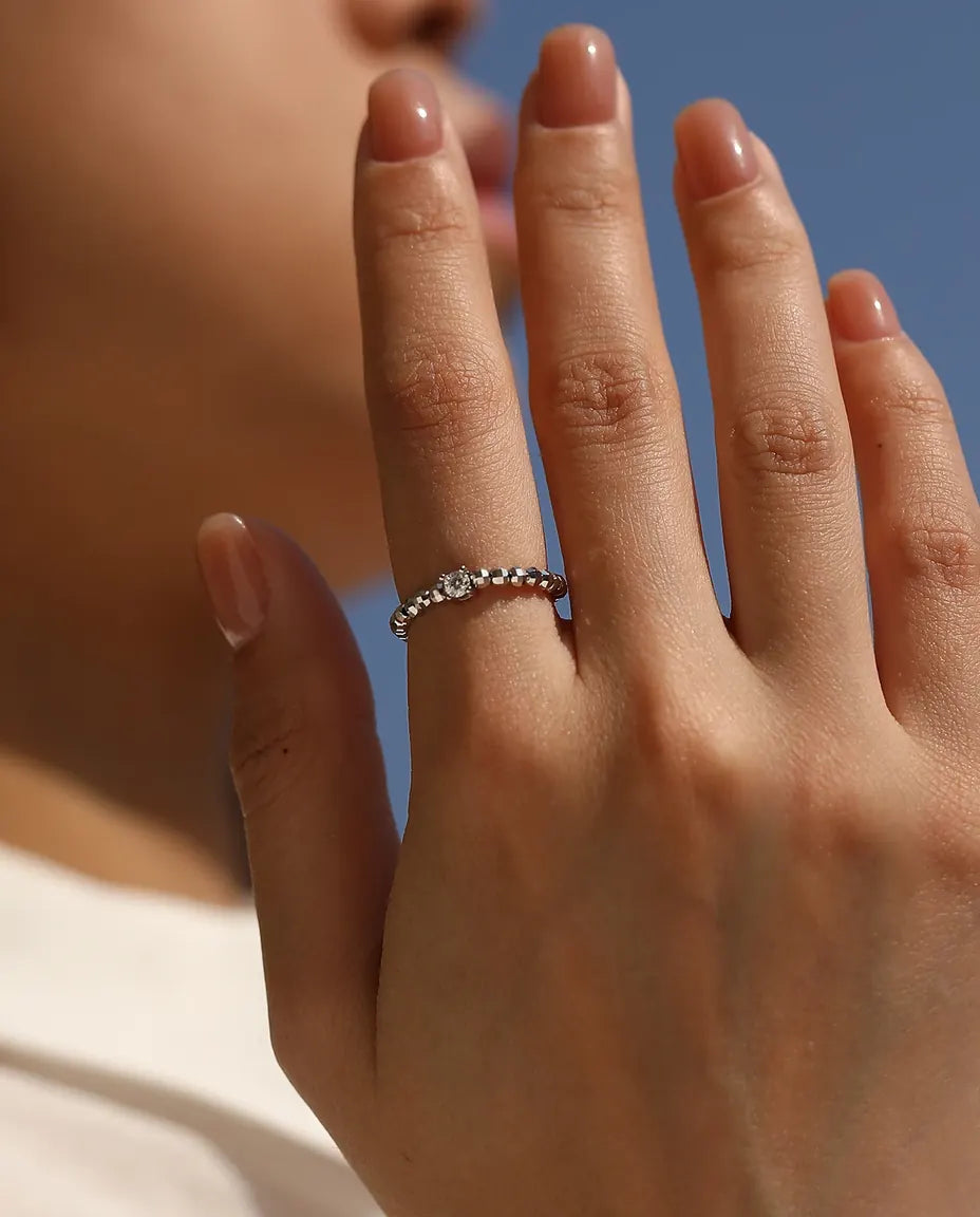 Teardrop moissanite ring on adjustable beaded sterling silver band